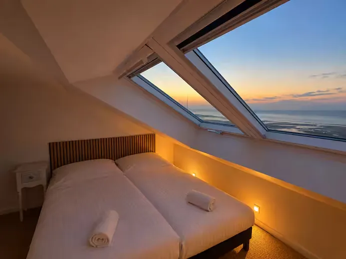Attic bedroom at sunset